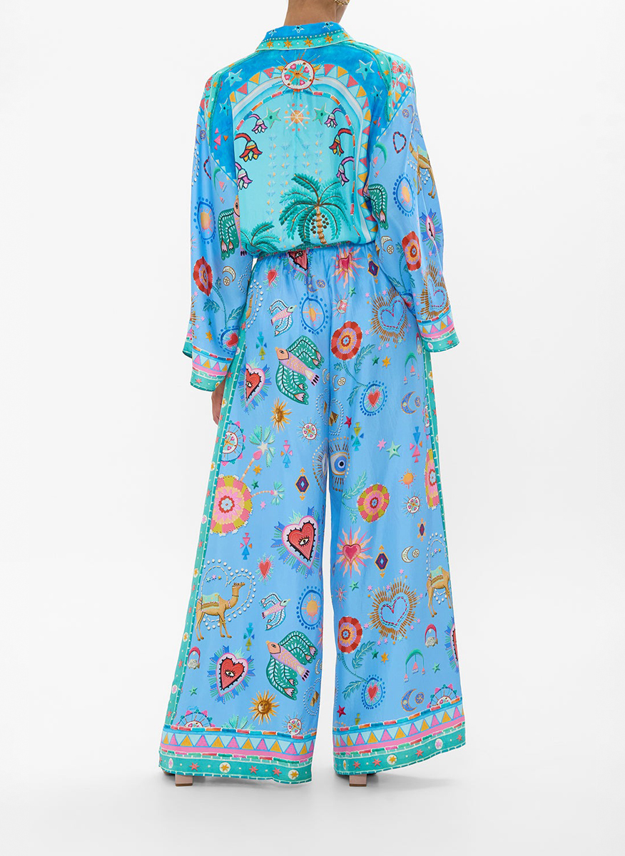 Camilla silk trousers with 'A painted village' print