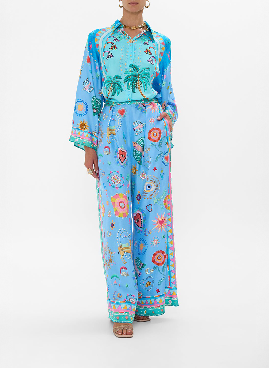 Camilla silk trousers with 'A painted village' print