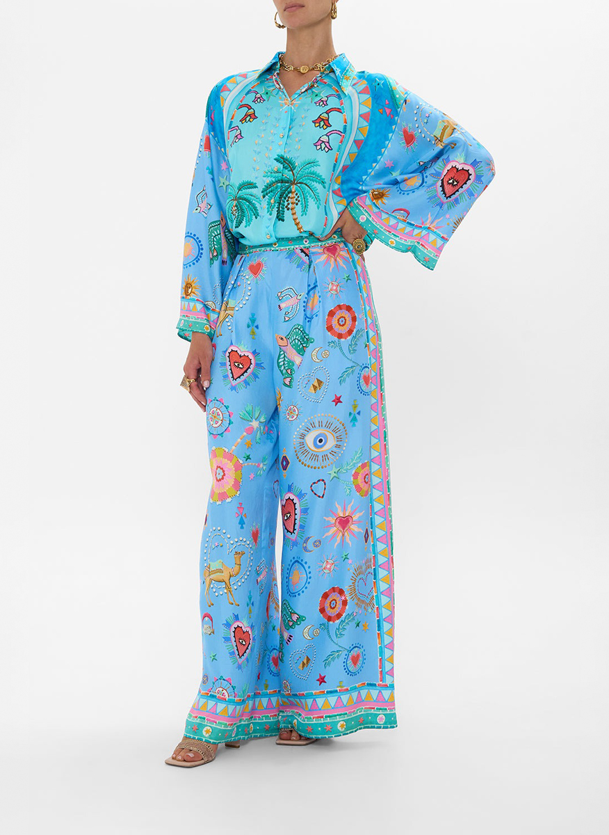 Camilla silk trousers with 'A painted village' print