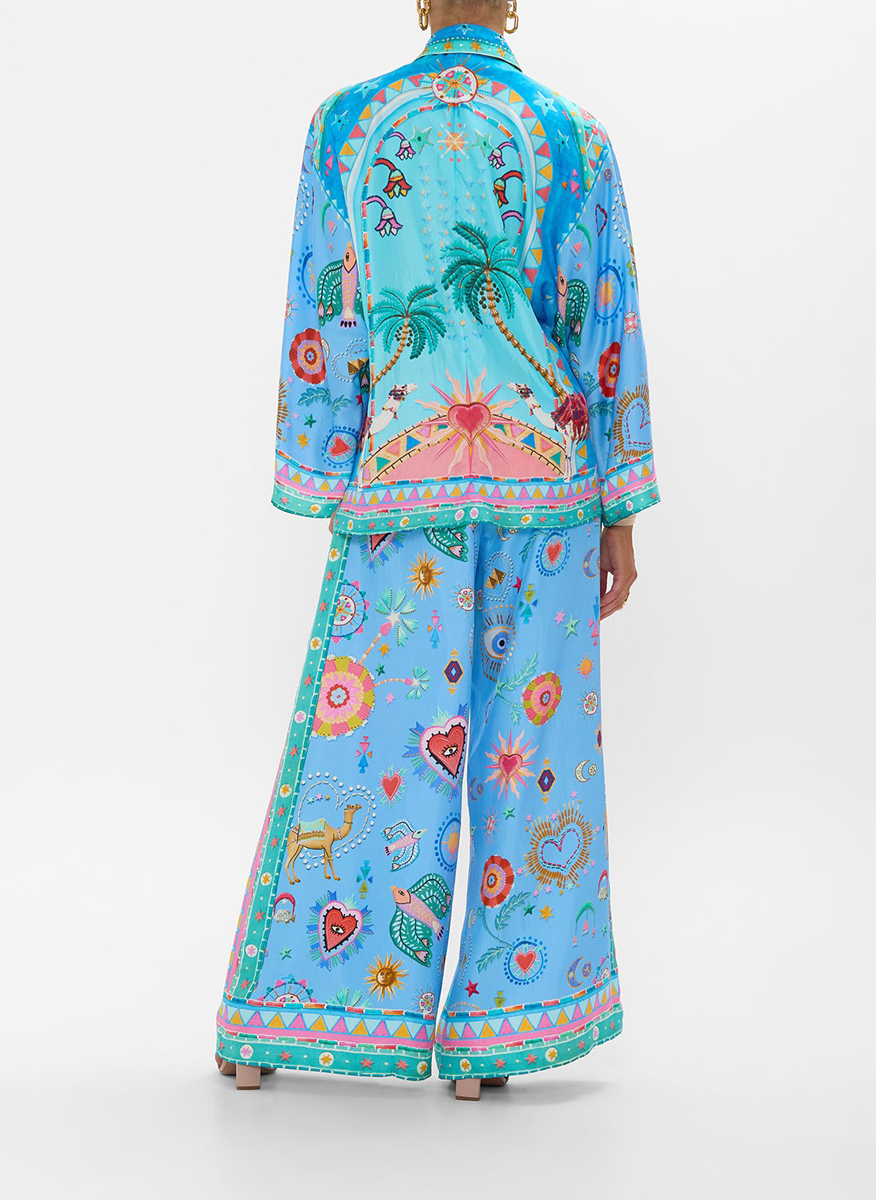 Camilla silk trousers with 'A painted village' print